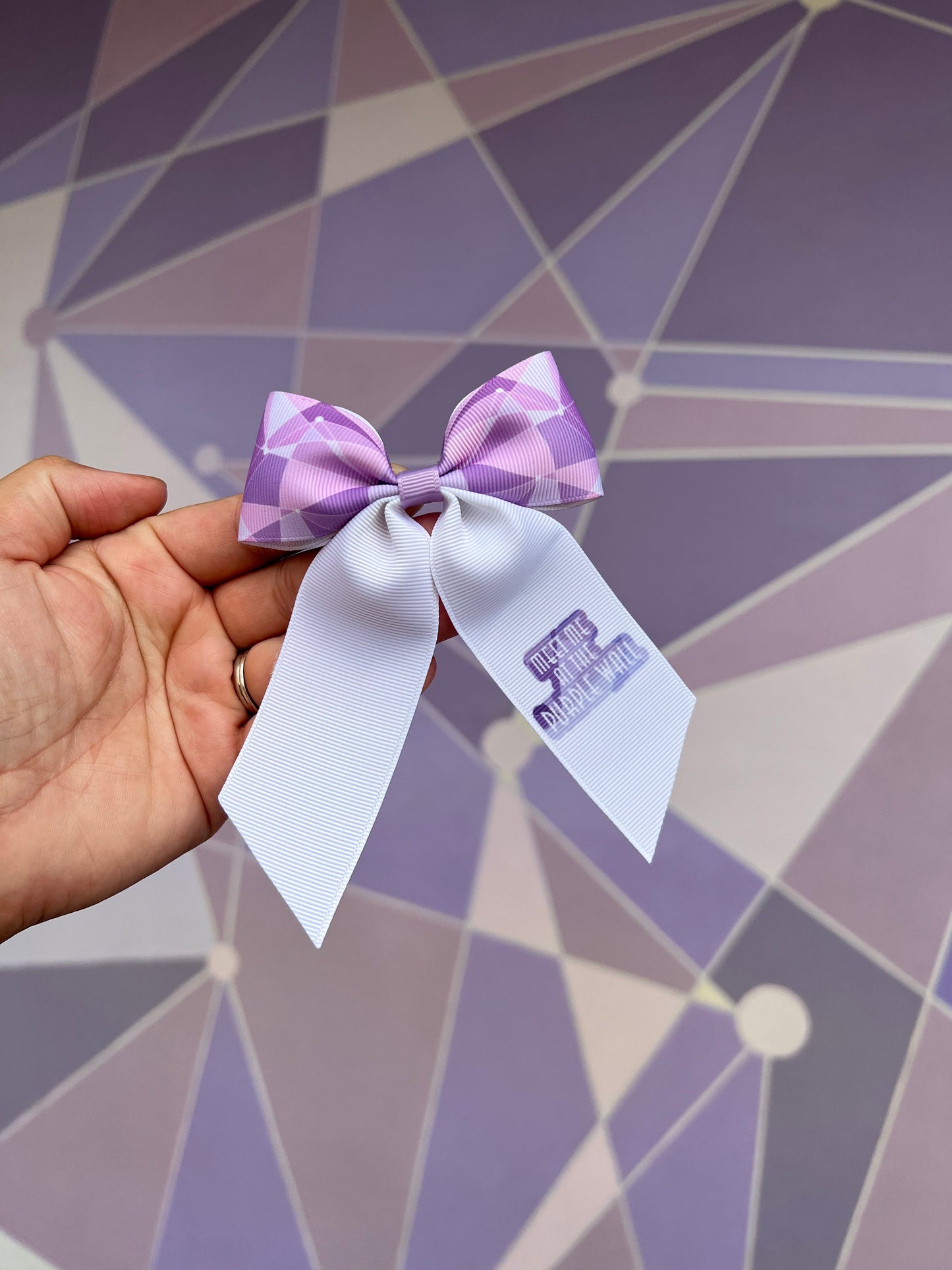 Meet me at the purple wall hair bow